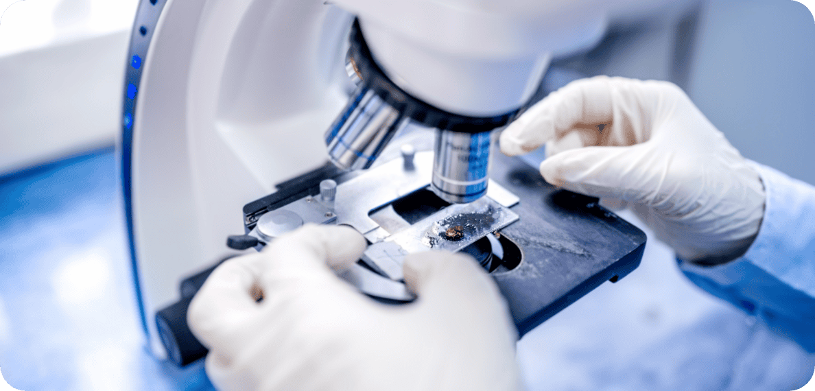 picture of someone watching a sample under a microscope